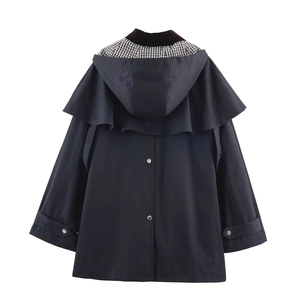 Navy blue hooded windbreaker jacket with stylish black and white plaid lining detail