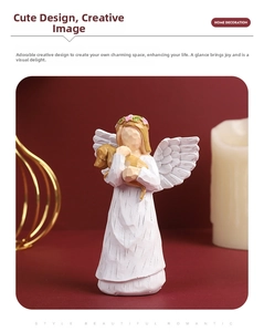 Close-up of hand-painted resin angel wings showing intricate wood-carved texture