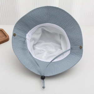 Detail view of quick-dry sun hat with breathable mesh lining and adjustable chin strap