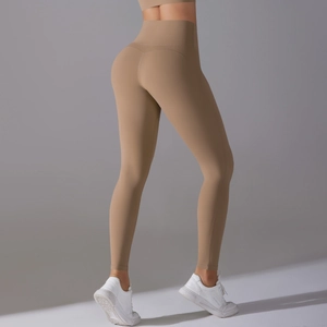 Detailed side view of high-waisted seamless khaki yoga leggings with body contouring fit