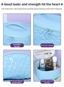 Detail view of heart-quilted blue makeup bag with waterproof PU fabric and sturdy zippers