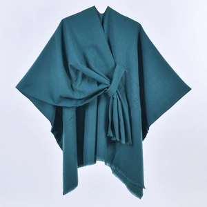 Elegant dark green wool shawl with front tie knot design and fringe trim on white background