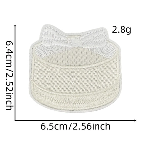 Detail of cream white bow embroidery patch with size dimensions 6.5x6.4cm and weight