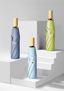 Three-fold umbrellas with minimalist wooden handles in Morandi blue and green tones
