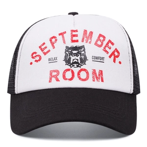 Classic black and white trucker hat with bulldog print and mesh back on white background