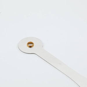 Polished silver metal clock hands with golden eyelets for precision clock mechanisms
