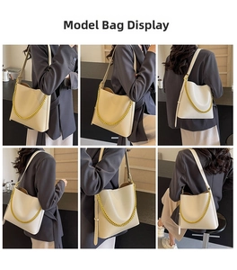 Detailed views of cream leather tote bag with thick gold chain and adjustable strap