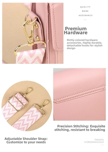 Detail of pink shoulder bag with gold hardware hooks and woven pattern strap