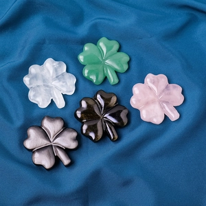 Polished natural crystal four-leaf clover carvings in assorted stone colors for home decor
