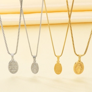 Retro 18K gold plated oval Virgin Mary pendant necklace on silky satin backdrop