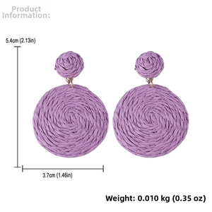 Detail view of purple raffia woven drop earrings with size measurements in centimeters