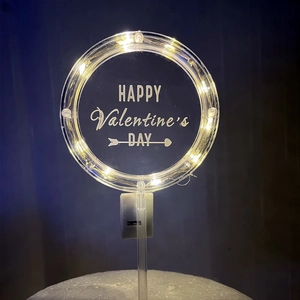 Glow-in-the-dark acrylic Valentine's Day cake topper with LED lights and heart engraving
