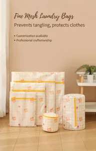 Detailed set of white mesh laundry bags with yellow bear prints and zippers for machines