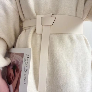 Minimalist cream white wide PU leather waist belt with knotted design for women dresses