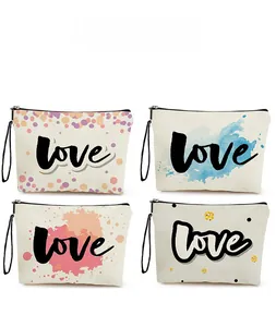 Canvas makeup bags with LOVE prints in pink polka dots and watercolor styles