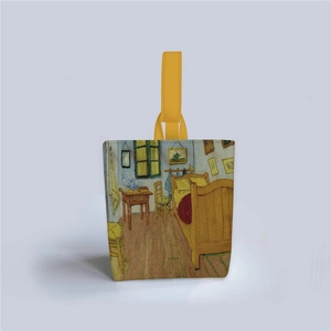 Detail of Van Gogh Arles Bedroom painting printed on a canvas tote bag with yellow straps