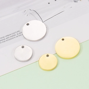 Polished gold and silver round stainless steel pendants in two sizes for DIY engraving