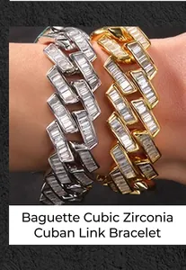 Dettaglio di bracciali a maglia cubana con pietre CZ in oro e argento al polso