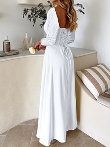 Elegant white long sleeve evening dress featuring a stylish lace-up back design for women