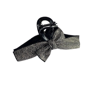 Elegant large black bow hair claw clip with sparkling rhinestones for sophisticated styling