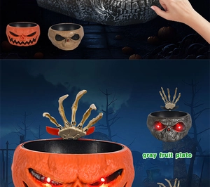 Ghostly Halloween candy bowl with skeletal hand and glowing red eyes for spooky decor