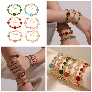 Detail view of colorful Czech glass stone bracelets with adjustable gold metal chains