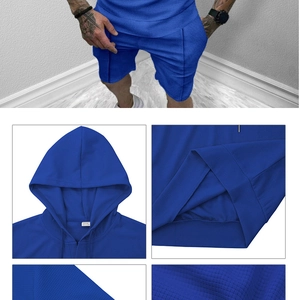 Detail of royal blue waffle knit hoodie set showing textured fabric and drawstring shorts