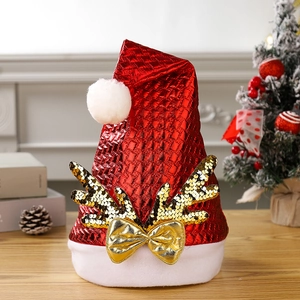 Red embossed Christmas hat with golden sequin antlers and white plush brim