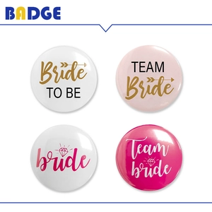 Set of four Bride to Be and Team Bride wedding party badges in pink and white