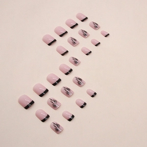 Short square pink and black French press-on nails with floral patterns and rhinestones