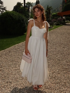 Robe midi blanche en coton style corset avec bretelles à nœuds et jupe ballon