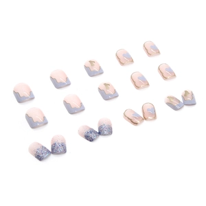 Short square press-on nails featuring cream blue hearts and purple marble wave designs