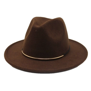 Close-up of brown wool fedora with black ribbon and gold metal buckle detail
