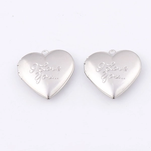 Detailed view of silver heart-shaped locket pendants with I Love You engraving