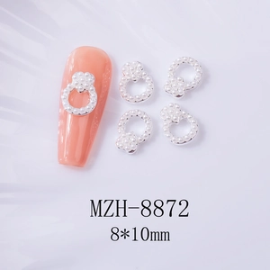 Détail de breloques nail art en forme de cercle creux argenté avec perles de 8x10mm