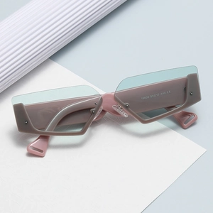 Retro geometric half-frame sunglasses in Morandi pink with light blue lenses