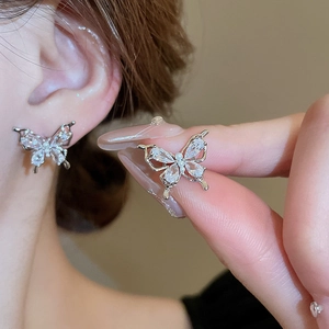 Elegant silver butterfly stud earrings with sparkling cubic zirconia and tiny pearl detail