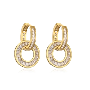 Detail of gold hoop earrings with baguette zircon stones and a circular dangle design