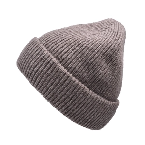 Close-up of thick ribbed knit texture on a cuffed wool beanie for winter warmth
