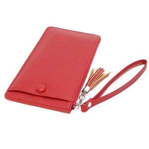 Portafoglio lungo minimalista in pelle rossa da donna con cerniera e nappa decorativa