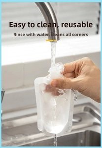 Waterproof thickened travel pouch being rinsed under a faucet for easy cleaning