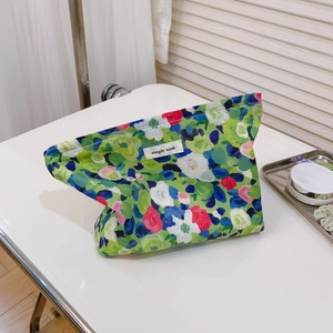 Artistic oil painting floral cotton makeup bag with simple wish label on white desk