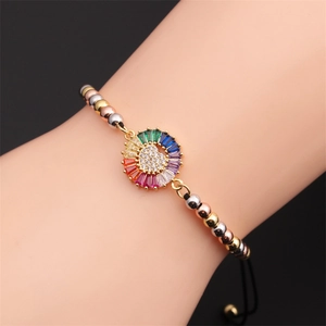Detailed close-up of a bohemian star bracelet featuring colorful gemstones and metal beads