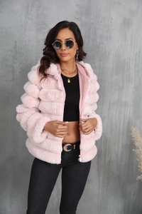 Close-up of pink faux fur jacket texture with hood and metallic zipper detail
