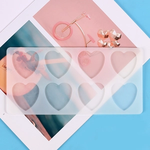Detailed top view of a rectangle silicone mold with 8 heart cavities for DIY cake or resin