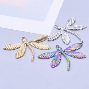 Three-color dragonfly pendants in gold silver and rainbow finish with detailed wing textures
