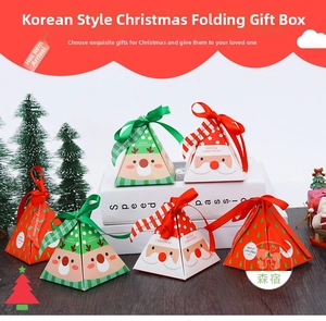 Triangle pyramid Christmas gift boxes with festive reindeer patterns and silk ribbons