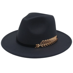 Detail of navy wool fedora with gold leaf metallic ornament on the black decorative ribbon