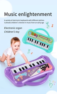 Detalle del piano de juguete de 22 teclas con mango para educación musical infantil