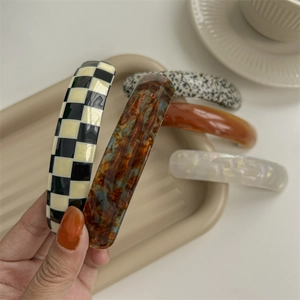 Elegant long acetate hair clips in tortoiseshell and checkerboard patterns for women
